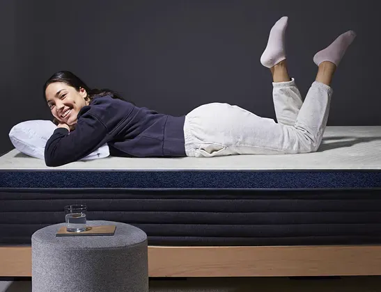 Woman laying on Helix mattress